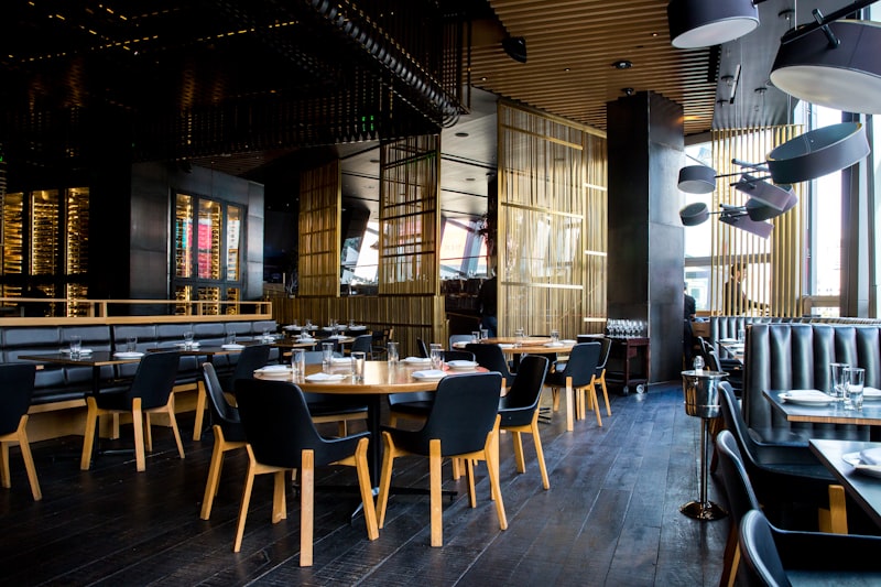 Restaurant chain NFC review card program — table-tent and checkout review prompts at scale