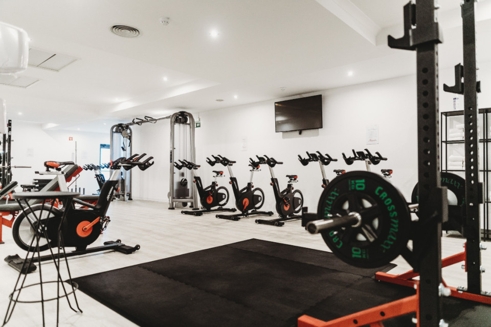Fitness studio NFC tap-to-review program — gym franchise review card playbook