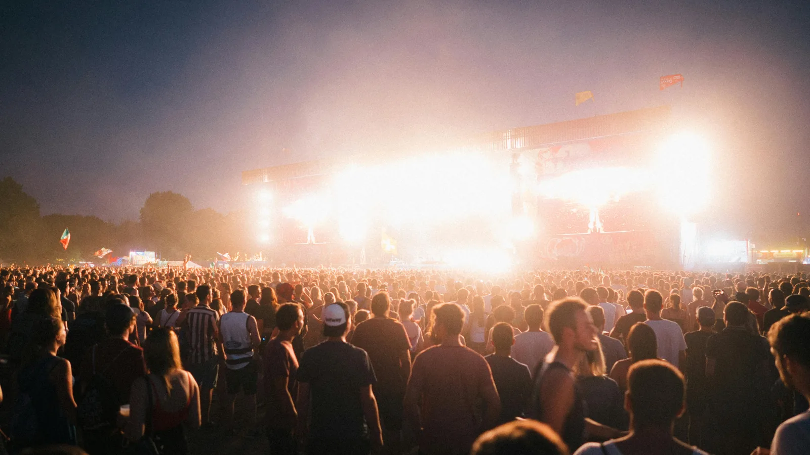 RFID Event Wristbands (2026): Material + Chip + Cashless Decision Matrix — Tomorrowland 400k Attendees, Coachella 25% Spend Lift, Bonnaroo Intellitix, Tappit 22% Takings Lift, {chip:nxp-ntag-424-dna:short_name} Anti-Clone
